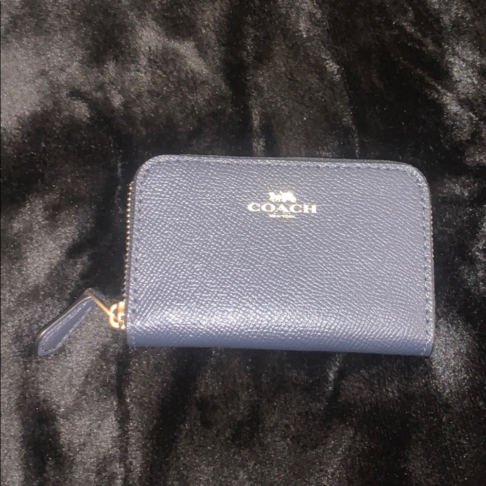 Coach zip around coin purse. New without tags.